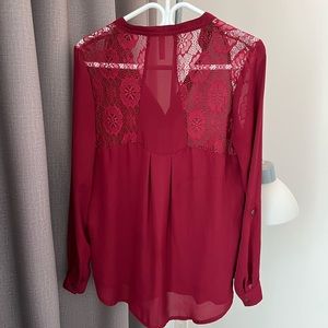 Red blouse with lace details